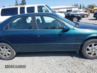 1998 Toyota Camry LE z VIN JT2BF28K4W0101312, wystawiony jako IAAI lot #42116546 z przebiegiem 365 712 mil mil oraz . Historia ofert i sprzedaży dostępna na DreamBid. Obrazek 13.
