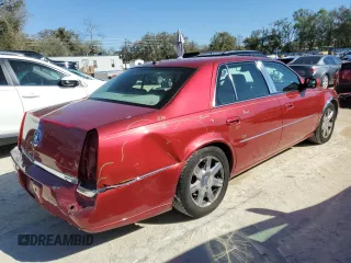 2007 Cadillac DTS V8 z VIN 1G6KD57Y67U181293, wystawiony jako Copart lot #48122555 z przebiegiem 137 962 mil mil oraz Szkody całkowita. Historia ofert i sprzedaży dostępna na DreamBid. Obrazek 3.