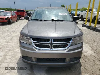 2013 Dodge Journey SE z VIN 3C4PDCAB0DT728950, wystawiony jako Copart lot #57525305 z przebiegiem 181 414 mil mil oraz Czysty tytuł • Clean title. Historia ofert i sprzedaży dostępna na DreamBid. Obrazek 5.