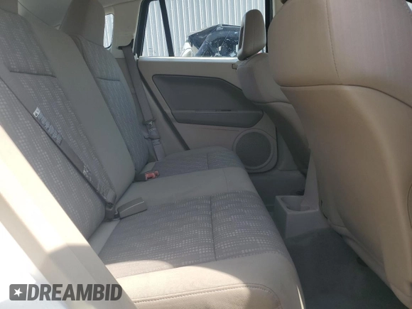 2007 Dodge Caliber SXT z VIN 1B3JB48B67D502642, wystawiony jako Copart lot #53378935 z przebiegiem 114 713 mil mil oraz Szkoda całkowita • Salvage title. Historia ofert i sprzedaży dostępna na DreamBid. Obrazek 10.
