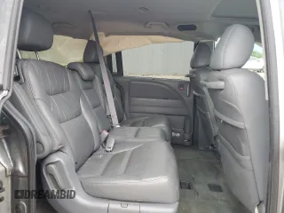 2007 Honda Odyssey EX-L z VIN 5FNRL38657B011922, wystawiony jako Copart lot #56147975 z przebiegiem 149 451 mil mil oraz Szkoda całkowita • Salvage title. Historia ofert i sprzedaży dostępna na DreamBid. Obrazek 11.