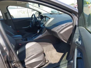 2014 Ford Focus Titanium with VIN 1FADP3N22EL317007, listed as a IAAI auction lot 42641134 with 159,705 mi miles and . Bid and sale history available at DreamBid. Image 5.