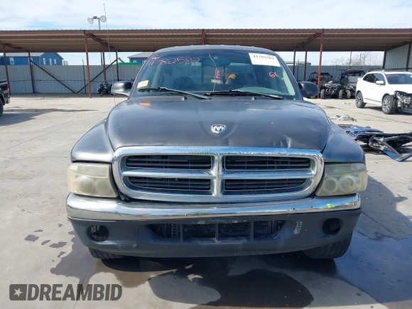 2001 Dodge Dakota z VIN 1B7HL2AX51S333575, wystawiony jako IAAI lot #41782582 z przebiegiem 291 640 mil mil oraz . Historia ofert i sprzedaży dostępna na DreamBid. Obrazek 12.