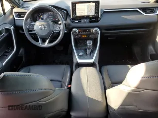 2020 Toyota RAV4 Hybrid XSE with VIN 4T3E6RFV2LU003980, listed as a Copart auction lot 48460515 with 59,317 mi miles and Salvage title. Bid and sale history available at DreamBid. Image 8.