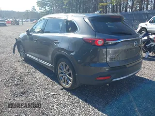 2019 Mazda CX-9 Grand Touring with VIN JM3TCBDY3K0307964, listed as a IAAI auction lot 41706594 with 170,596 mi miles and . Bid and sale history available at DreamBid. Image 3.