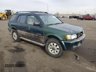 2000 Honda Passport LX с VIN 4S6DM58W0Y4406220, выставлен на аукционе Copart как лот 82774694 с пробегом 171 487 миль миль и Списание • Salvage title. История ставок и продаж доступна на DreamBid. Изображение 4.