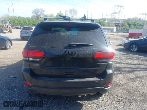 2018 Jeep Grand Cherokee Laredo E with VIN 1C4RJFAG2JC320441, listed as a IAAI auction lot 42095419 with 136,962 mi miles. Bid and sale history available at carsss.com. Image 16.