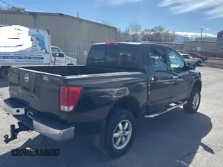 2004 Nissan Titan LE with VIN 1N6AA07A84N590583, listed as a Copart auction lot 49112705 with 92,426 mi miles and Salvage Title. Bid and sale history available at DreamBid. Image 4.
