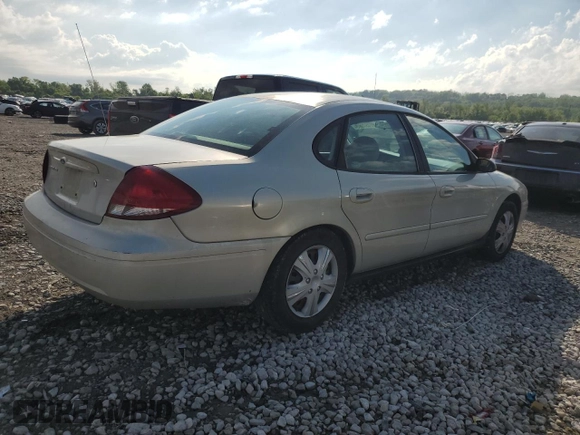 2005 Ford Taurus SE with VIN 1FAFP53U95A101336, listed as a Copart auction lot 56457095 with 127,656 mi miles and Salvage title. Bid and sale history available at DreamBid. Image 3.