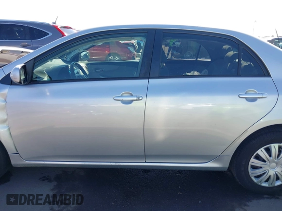 2011 Toyota Corolla L with VIN JTDBU4EE0B9151332, listed as a IAAI auction lot 41970433 with 113,157 mi miles. Bid and sale history available at carsss.com. Image 14.