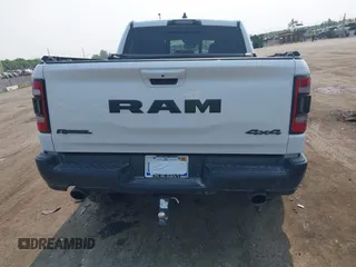 2022 Ram 1500 Rebel with VIN 1C6SRFLT5NN318494, listed as a IAAI auction lot 42413194 with 59,458 mi miles and . Bid and sale history available at DreamBid. Image 16.