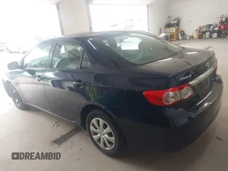 2013 Toyota Corolla L with VIN 5YFBU4EE8DP217364, listed as a IAAI auction lot 42144930 with 164,721 mi miles and . Bid and sale history available at DreamBid. Image 3.