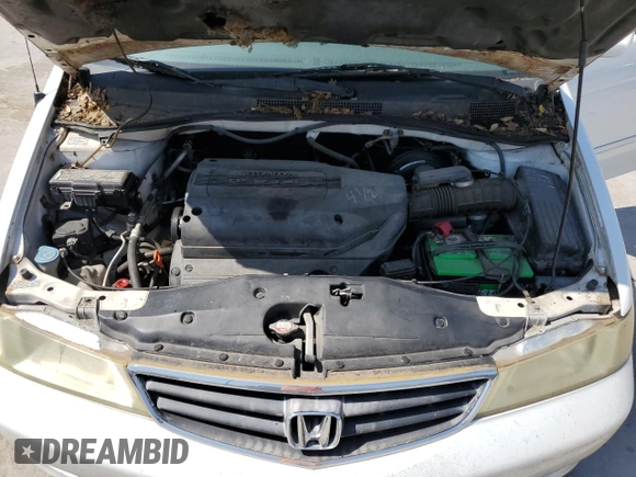 2004 Honda Odyssey EX-L with VIN 5FNRL18974B092979, listed as a Copart auction lot 52429055 with 106,515 mi miles and Clean Title. Bid and sale history available at DreamBid. Image 12.
