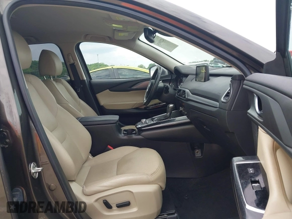 2017 Mazda CX-9 Touring z VIN JM3TCACY7H0129335, wystawiony jako IAAI lot #42289926 z przebiegiem 60 425 mil mil oraz . Historia ofert i sprzedaży dostępna na DreamBid. Obrazek 5.