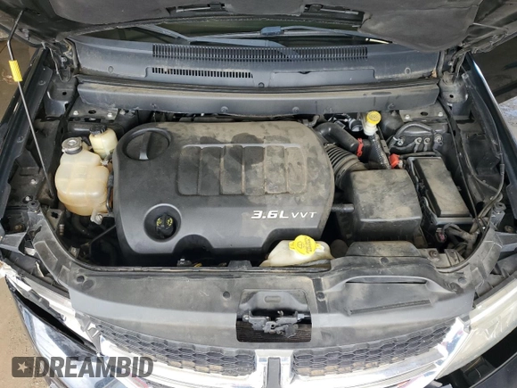 2015 Dodge Journey SXT with VIN 3C4PDDBG7FT646152, listed as a Copart auction lot 58371505 with 143,759 mi miles and Salvage title. Bid and sale history available at DreamBid. Image 12.