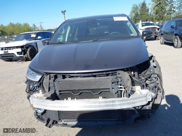 2023 Chrysler Pacifica Touring L with VIN 2C4RC1BG5PR550499, listed as a IAAI auction lot 42055738 with 53,137 mi miles. Bid and sale history available at carsss.com. Image 13.
