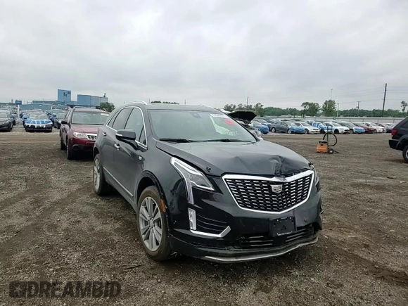 2023 Cadillac XT5 AWD Premium Luxury with VIN 1GYKNDR45PZ224937, listed as a Copart auction lot 57599125 with 12,905 mi miles and Salvage title. Bid and sale history available at DreamBid. Image 14.