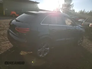 2015 Audi Q3 2.0T Prestige with VIN WA1GFCFS8FR007672, listed as a Copart auction lot 83324044 with 0 mi miles and Salvage Title. Bid and sale history available at carsss.com. Image 3.