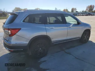2019 Honda Pilot Elite with VIN 5FNYF6H0XKB059988, listed as a Copart auction lot 74472194 with 63,742 mi miles and Salvage title. Bid and sale history available at DreamBid. Image 3.