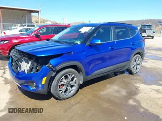 2021 Kia Seltos EX with VIN KNDERCAAXM7167273, listed as a IAAI auction lot 41839652 with 64,256 mi miles and . Bid and sale history available at DreamBid. Image 2.
