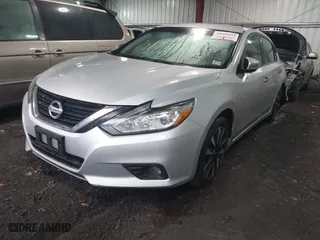 2018 Nissan Altima 2.5 SL with VIN 1N4AL3AP9JC177340, listed as a IAAI auction lot 41800890 with 120,439 mi miles. Bid and sale history available at carsss.com. Image 18.