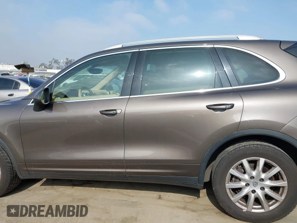 2013 Porsche Cayenne with VIN WP1AA2A27DLA12307, listed as a IAAI auction lot 42310717 with 175,679 mi miles and . Bid and sale history available at DreamBid. Image 14.