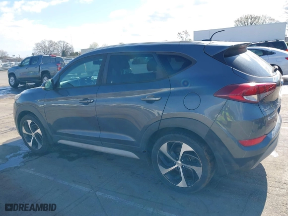 2017 Hyundai Tucson Value with VIN KM8J33A25HU402366, listed as a IAAI auction lot 41814426 with 117,669 mi miles. Bid and sale history available at carsss.com. Image 14.