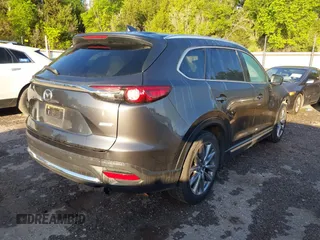 2018 Mazda CX-9 Grand Touring with VIN JM3TCBDY3J0231936, listed as a IAAI auction lot 42159391 with 105,125 mi miles and . Bid and sale history available at DreamBid. Image 4.