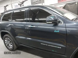 2014 Jeep Grand Cherokee Limited z VIN 1C4RJFBG6EC545417, wystawiony jako IAAI lot #42288236 z przebiegiem 130 229 mil mil oraz . Historia ofert i sprzedaży dostępna na DreamBid. Obrazek 14.