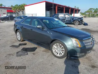 2011 Cadillac CTS with VIN 1G6DA5EY0B0112944, listed as a IAAI auction lot 42682667 with 77,165 mi miles and . Bid and sale history available at DreamBid. Image 1.