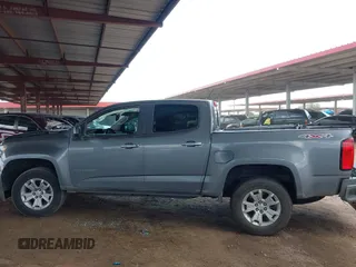 2021 Chevrolet Colorado 4WD LT with VIN 1GCGTCEN1M1107053, listed as a IAAI auction lot 42430796 with 76,128 mi miles and . Bid and sale history available at DreamBid. Image 15.