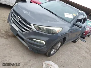 2017 Hyundai Tucson Value with VIN KM8J33A22HU358357, listed as a IAAI auction lot 41583774 with 139,338 mi miles. Bid and sale history available at carsss.com. Image 18.