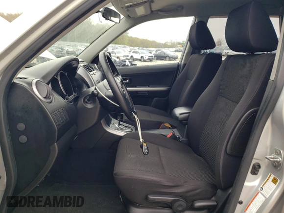 2011 Suzuki Grand Vitara Premium with VIN JS3TD0D22B4102068, listed as a Copart auction lot 55260505 with 142,934 mi miles and Clean title. Bid and sale history available at DreamBid. Image 7.