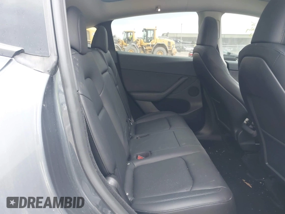 2023 Tesla Model Y Performance with VIN 7SAYGDEF2PF757113, listed as a IAAI auction lot 41881175 with 54,809 mi miles and . Bid and sale history available at DreamBid. Image 8.