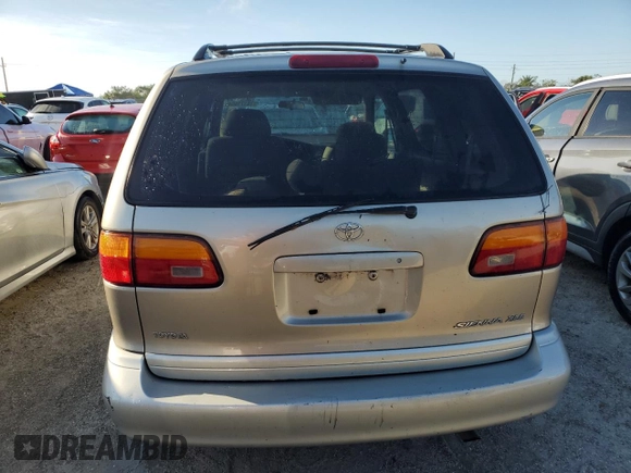2000 Toyota Sienna LE with VIN 4T3ZF13C8YU177856, listed as a Copart auction lot 74171654 with 293,172 mi miles and Non Repairable. Bid and sale history available at carsss.com. Image 6.