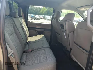 2019 Ford F-150 XL with VIN 1FTEW1EP7KFA47638, listed as a Copart auction lot 60193125 with 127,022 mi miles and Salvage title. Bid and sale history available at DreamBid. Image 10.