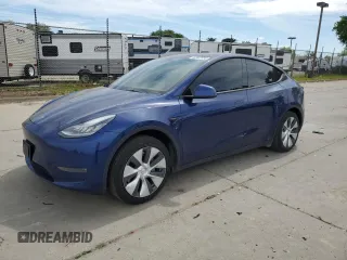 2021 Tesla Model Y Long Range with VIN 5YJYGDEE3MF094165, listed as a Copart auction lot 52907835 with 141,260 mi miles and Salvage Title. Bid and sale history available at DreamBid. Image 1.