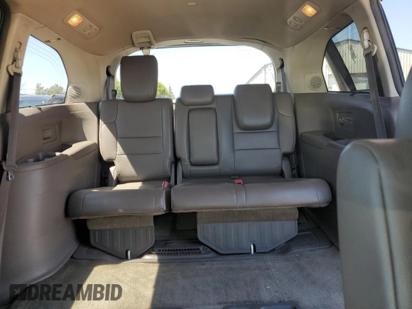 2015 Honda Odyssey Touring Elite with VIN 5FNRL5H92FB504977, listed as a Copart auction lot 56657195 with 189,438 mi miles and Salvage title. Bid and sale history available at DreamBid. Image 10.