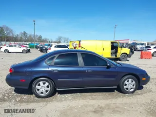 1998 Ford Taurus LX with VIN 1FAFP52U0WA226924, listed as a IAAI auction lot 41702083 with 55,998 mi miles. Bid and sale history available at carsss.com. Image 13.