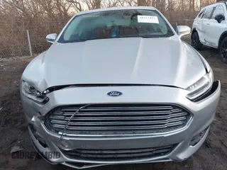 2013 Ford Fusion SE z VIN 3FA6P0H96DR268474, wystawiony jako IAAI lot #41757472 z przebiegiem 159 529 mil mil oraz . Historia ofert i sprzedaży dostępna na DreamBid. Obrazek 12.