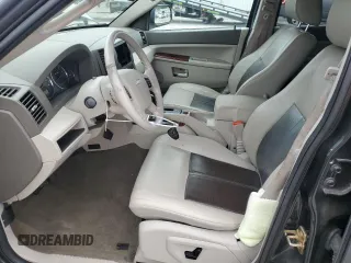 2005 Jeep Grand Cherokee Limited with VIN 1J4HR58N75C629440, listed as a Copart auction lot 58539715 with 146,144 mi miles and Salvage title. Bid and sale history available at DreamBid. Image 7.