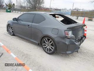 2015 Scion tC with VIN JTKJF5C72F3089756, listed as a IAAI auction lot 41554749 with 66,883 mi miles. Bid and sale history available at carsss.com. Image 3.