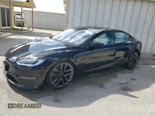 2022 Tesla Model S Plaid z VIN 5YJSA1E64NF461218, wystawiony jako Copart lot #74178794 z przebiegiem Nie podano mil oraz Szkoda całkowita • Salvage title. Historia ofert i sprzedaży dostępna na DreamBid. Obrazek 1.