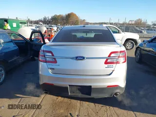 2014 Ford Taurus SEL z VIN 1FAHP2E87EG121069, wystawiony jako IAAI lot #41030422 z przebiegiem 138 043 mil mil oraz . Historia ofert i sprzedaży dostępna na DreamBid. Obrazek 16.