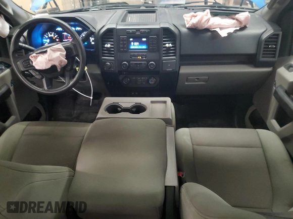 2015 Ford F-150 XLT with VIN 1FTEX1EP6FFC20794, listed as a Copart auction lot 60550415 with 101,324 mi miles and Salvage title. Bid and sale history available at DreamBid. Image 8.