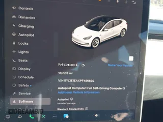 2023 Tesla Model 3 with VIN 5YJ3E1EAXPF486639, listed as a IAAI auction lot 41387797 with 18,603 mi miles and . Bid and sale history available at carsss.com. Image 7.