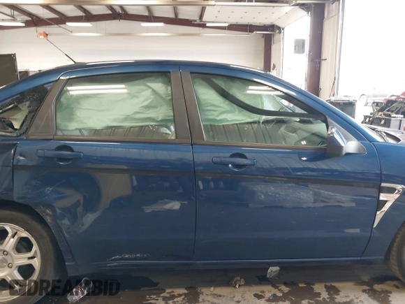 2008 Ford Focus SE with VIN 1FAHP35N78W191984, listed as a IAAI auction lot 41839286 with 129,290 mi miles. Bid and sale history available at carsss.com. Image 13.