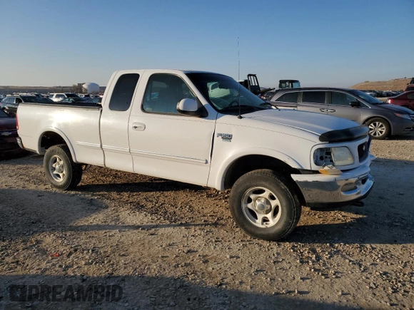 1998 Ford F-150 z VIN 1FTZX18W3WKB01774, wystawiony jako Copart lot #88670315 z przebiegiem 102 301 mil mil oraz Szkoda całkowita • Salvage title. Historia ofert i sprzedaży dostępna na DreamBid. Obrazek 4.