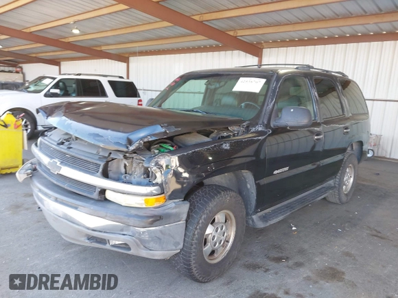 2002 Chevrolet Tahoe LS with VIN 1GNEC13V42J188049, listed as a IAAI auction lot 42538707 with 287,452 mi miles and . Bid and sale history available at DreamBid. Image 2.