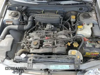 1999 Subaru Impreza L with VIN JF1GF4351XH815210, listed as a Copart auction lot 71250504 with 141,806 mi miles and Salvage title. Bid and sale history available at DreamBid. Image 12.